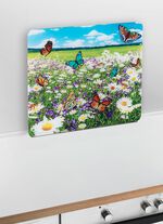 Wandpaneel van glas met zomerweidemotief 