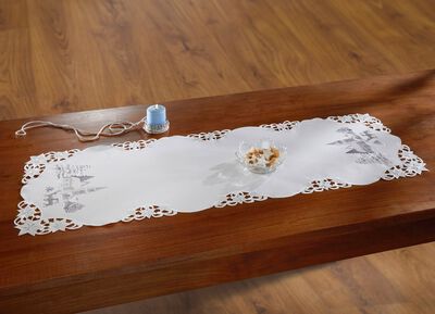 Tafelkleed met een romantisch winterdorp-motief 