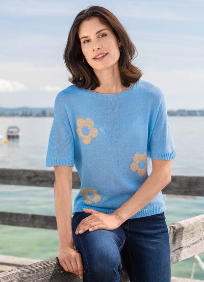 Glittertrui met bloemenmotieven 