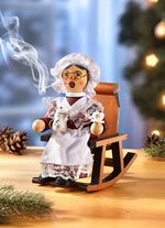 Rokende figuur oma in een schommelstoel 