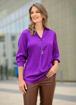 Tuniek met opvallende halslijn 