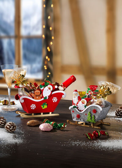 Kerstslee met kerstlekkernijen 