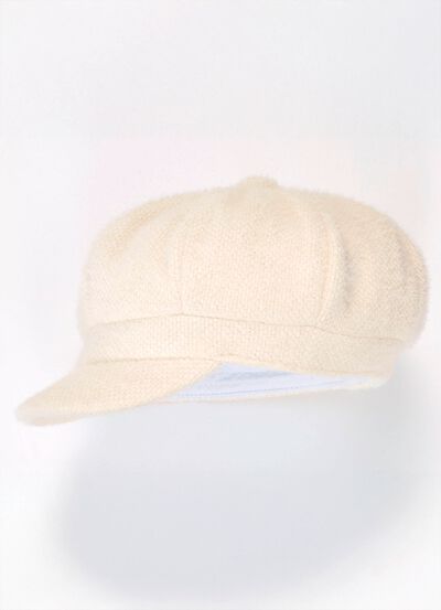 Elegante dames krantenjongenspet met elastiek aan de achterkant 