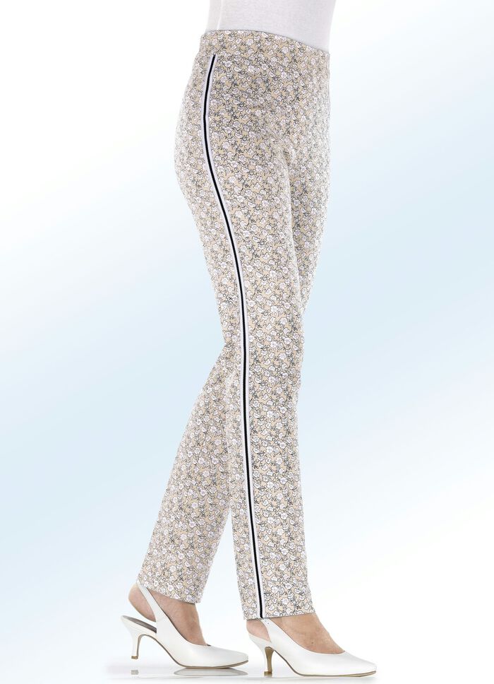 Broek met een opvallend bloemmotief en een effectieve decoratieve band BEIGE-WIT