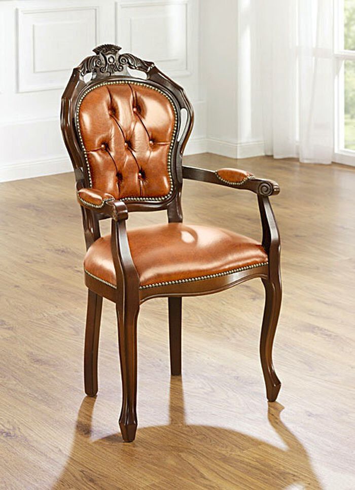 Eetkamerstoelen en fauteuils met leren bekleding 