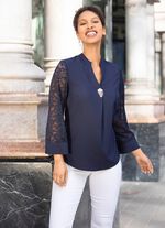 Tuniek met afneembare broche 