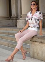 Ponchotuniek met decoratieve hanger 