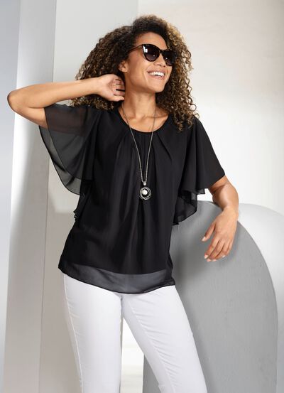 Poncho tuniek met vleermuismouwen 