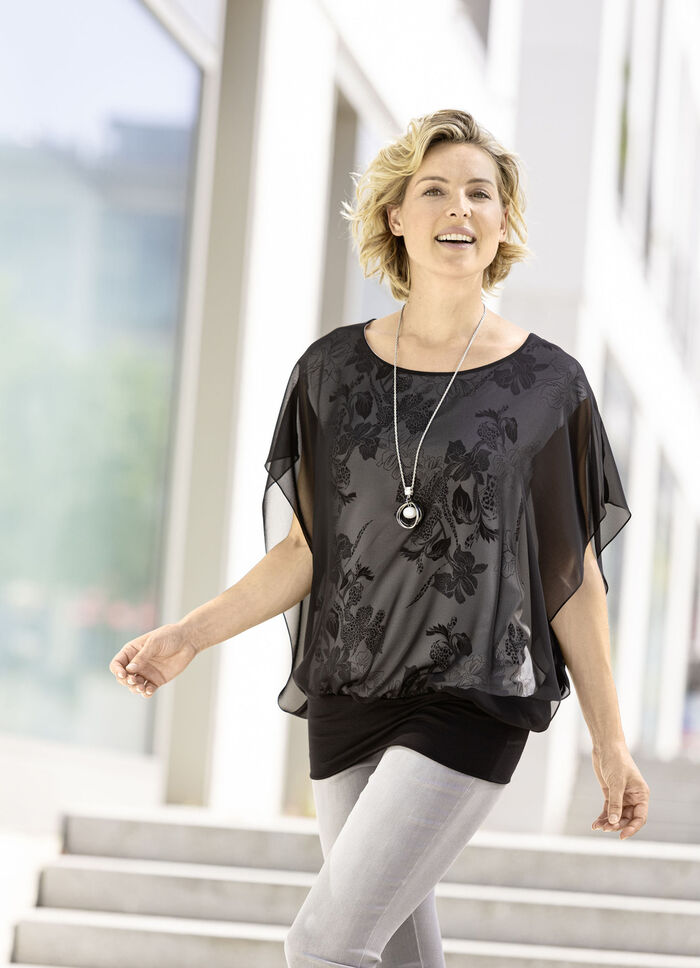 Ponchotuniek met chiffon bies 