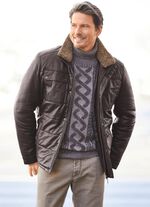 Kort leren jack met echte lamsvachtafwerking 