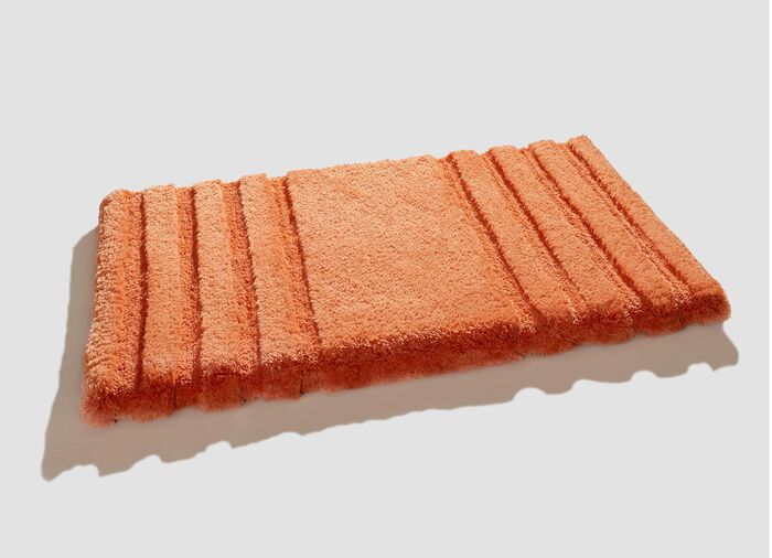 Pluisvrije badkamerset met antislip achterkant MANDARIJN