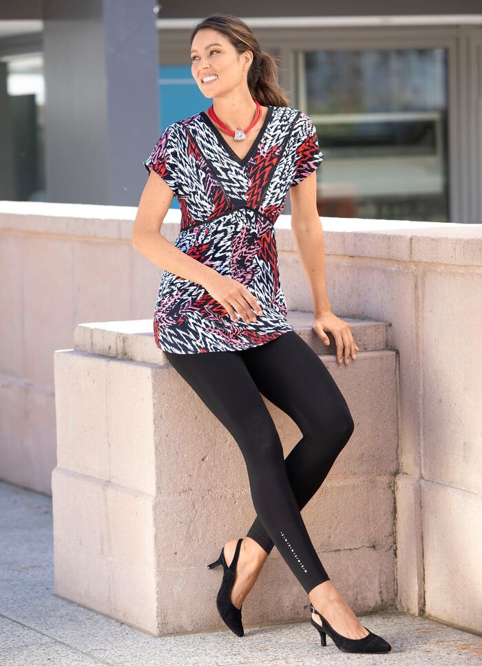 Legging met elegant glanzend decoratief motief 