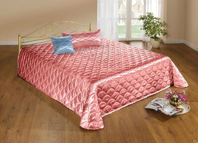 Elegante, glanzende sprei en kussenslopen met quilting in schelplook 