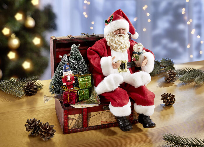 Kerstman op een kist 