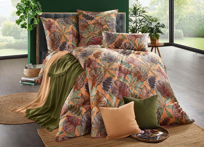 Deken en kussensloop in een leuke gebreide look GROEN