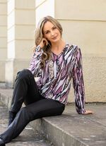 Tuniek met decoratieve knopen 