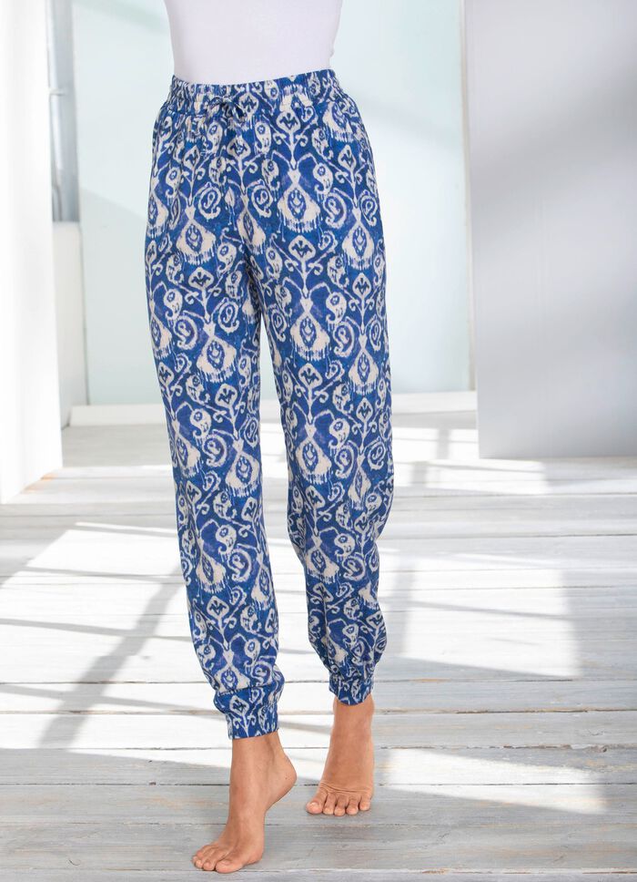 Broek met glanzende gekleurde inkjetprint 