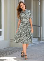 Jurk met een doorlopende decoratieve knoopsluiting 