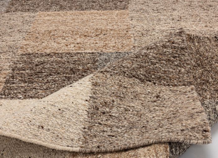 Bruggen en tapijten van scheerwol 