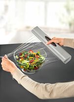 Foliedispenser met veermechanisme 