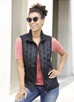 Functioneel vest in een actuele materiaalmix 