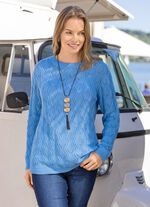 Trui met een langer wordend golfontwerp 