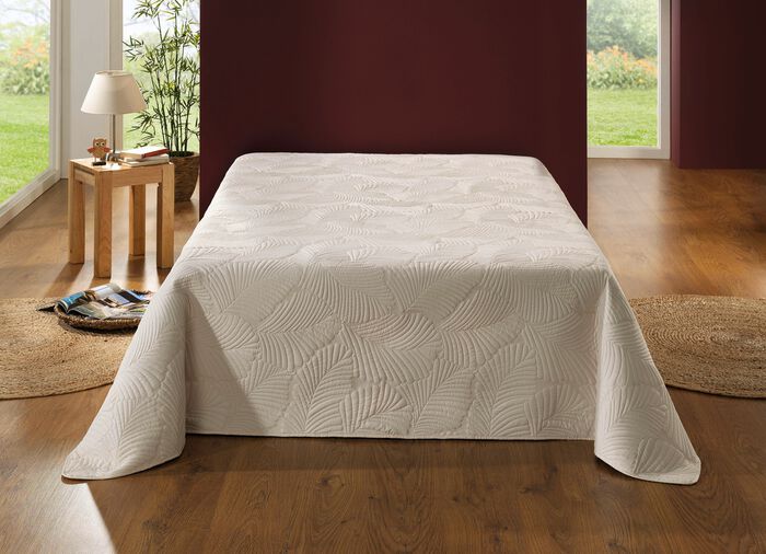 Gezellige sprei en bijpassende kussenslopen 