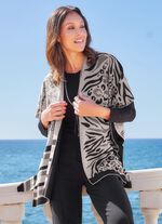Poncho met elegant jacquarddesign 